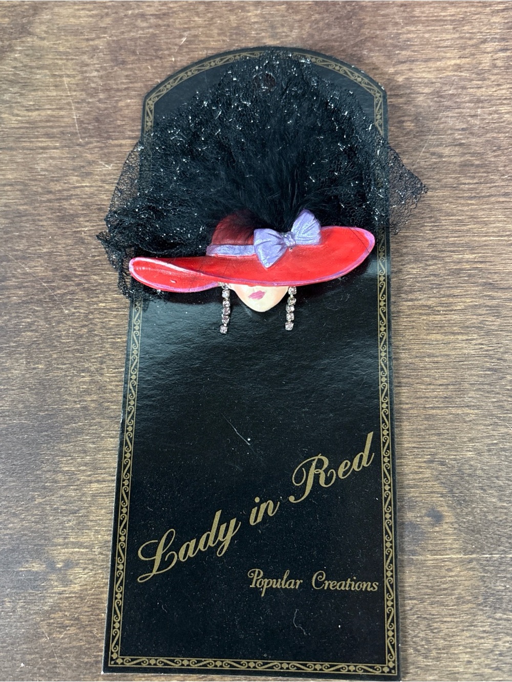 Lady in Red Decorative Hat Brooch with Black Feather and Rhinestone Earrings